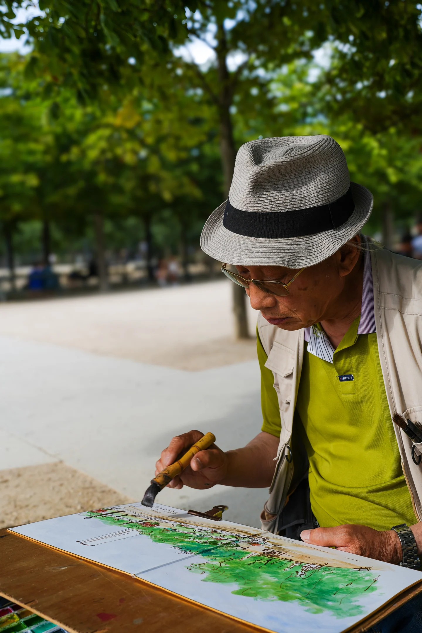 A street artist working on a painting