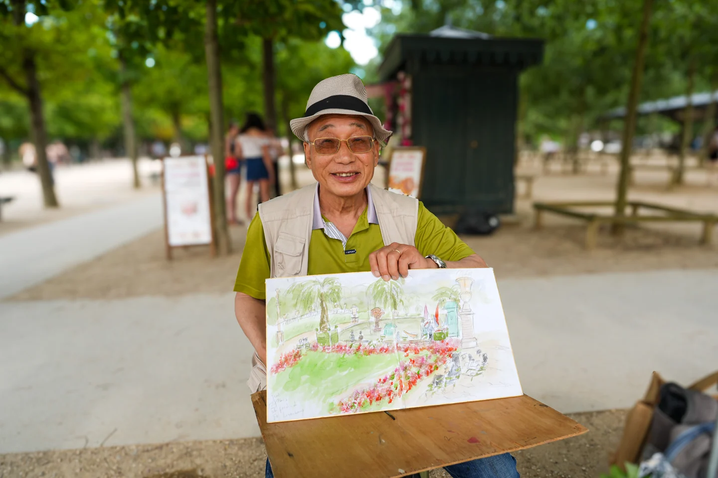 A street artist with his paintings